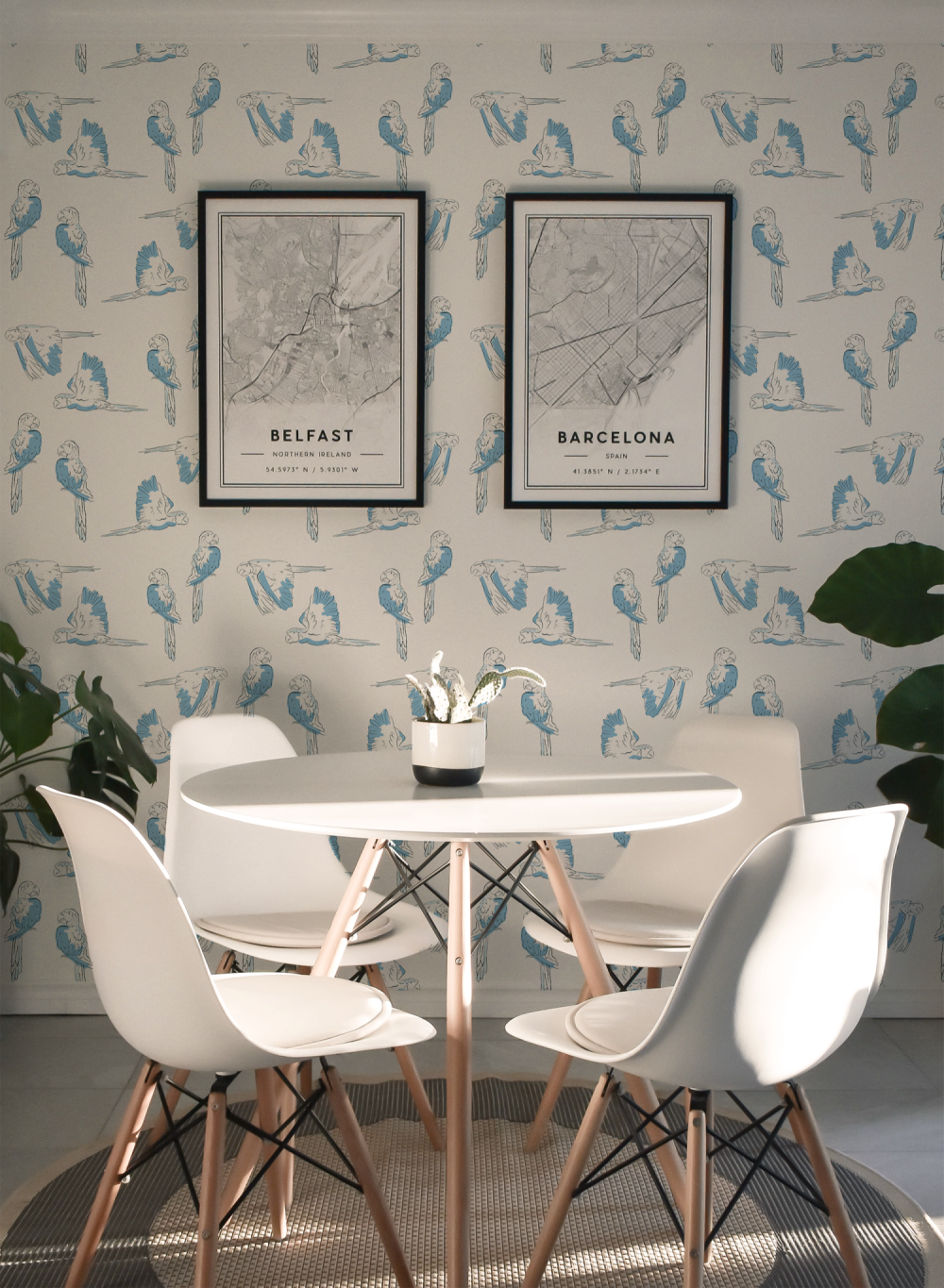 Macaws flying two by two in blue and white wallpaper by Modern Magic